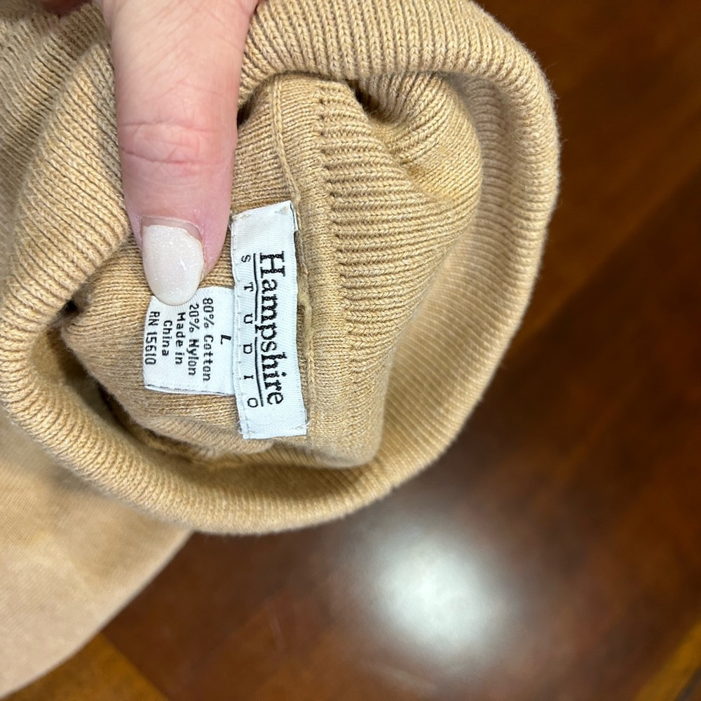 Sleeveless turtleneck sweater